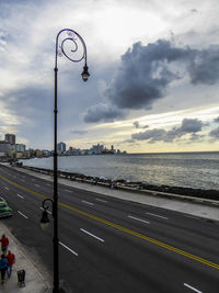 Road against cloudy sky