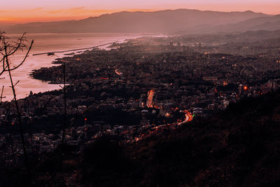 High angle view of townscape against sky at sunset