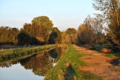 Scenic view of lake against sky during autumn