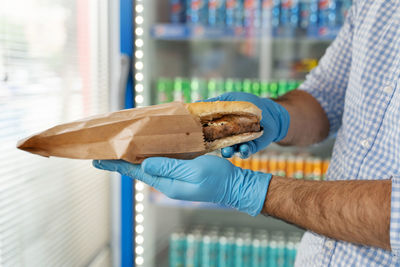 Close-up of man holding ice cream