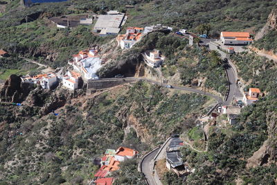 High angle view of road amidst buildings in city