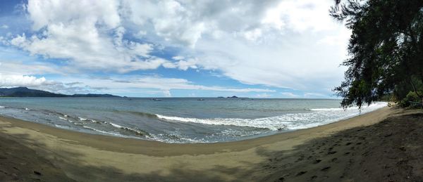 Panoramic view of beach against sky