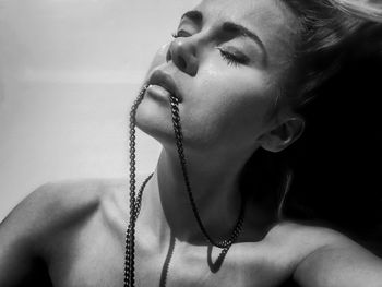 Close-up portrait of a serious young woman