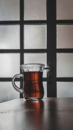 Close-up of coffee cup on table