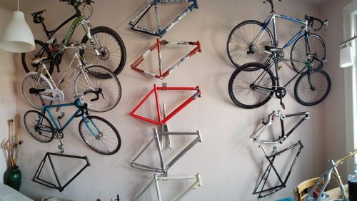 High angle view of bicycles on table against wall