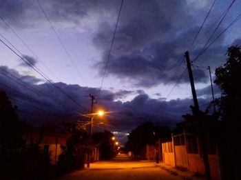 Illuminated street at night