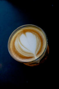 Close-up of cappuccino on table