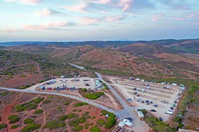 High angle view of road amidst landscape against sky