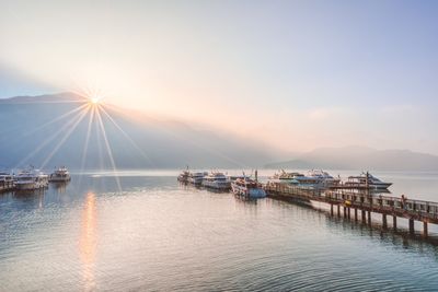 Scenic view of sea against clear sky during sunset