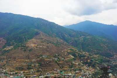 Aerial view of landscape and mountains against sky