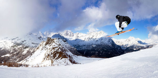 Scenic view of snowcapped mountain against sky