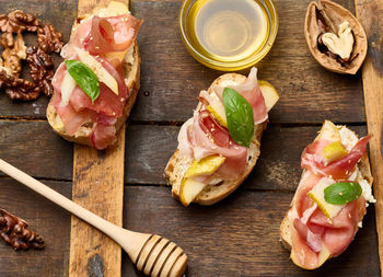 High angle view of food on cutting board on table