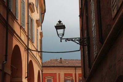 Low angle view of street light against sky