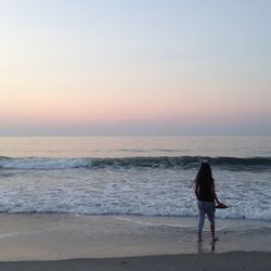 Scenic view of sea at sunset