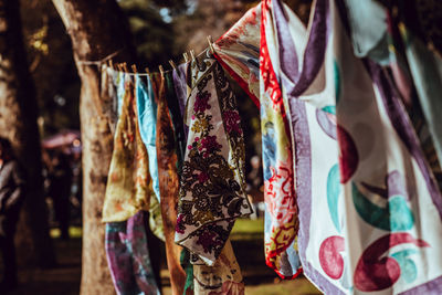 Close-up of clothes hanging in store for sale