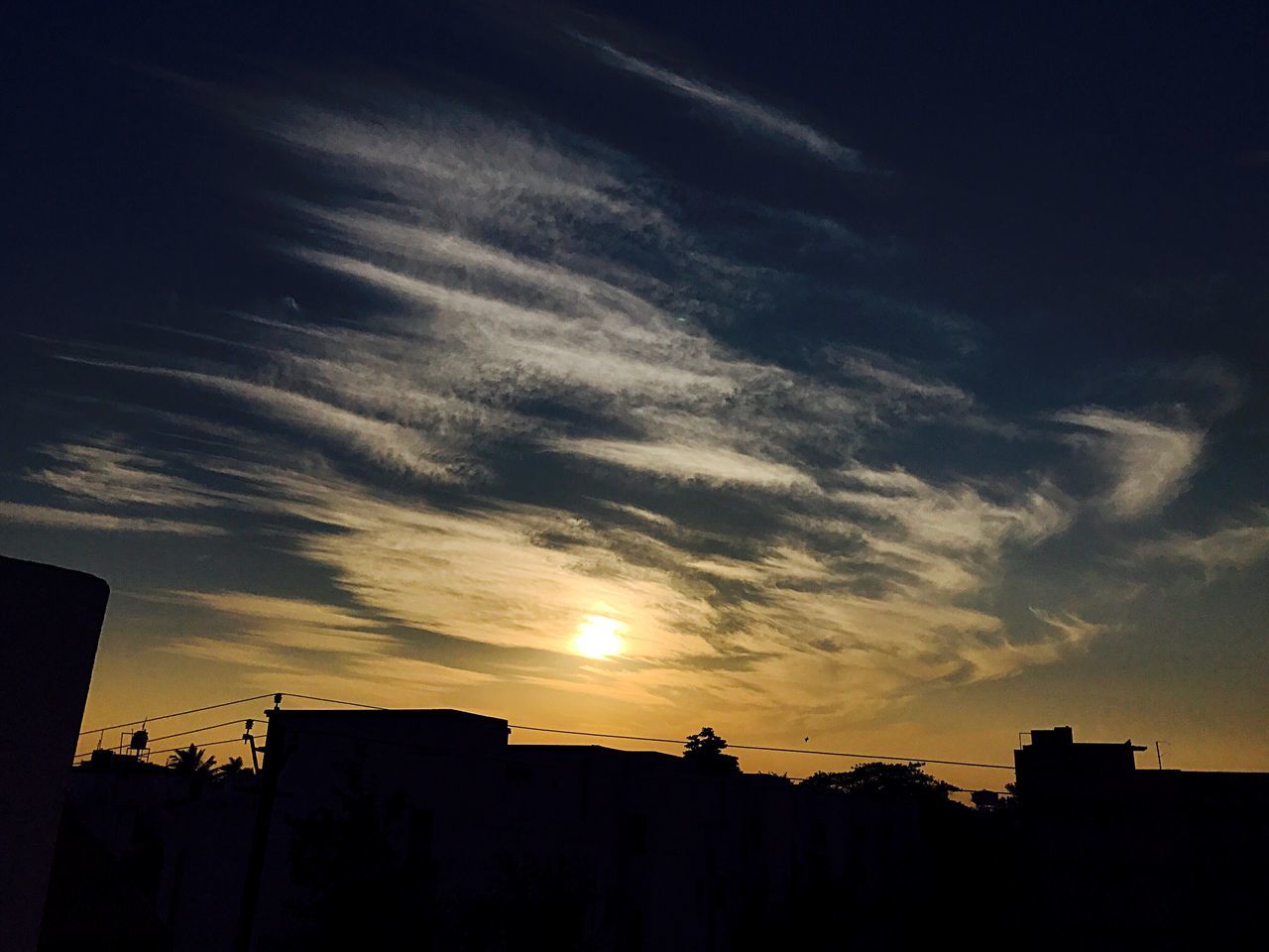 sunset, built structure, sky, silhouette, building exterior, no people, low angle view, house, outdoors, nature, scenics, city, cloud - sky, architecture, beauty in nature, night