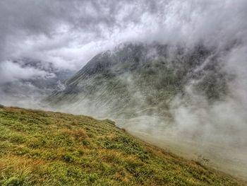 Scenic view of land against sky