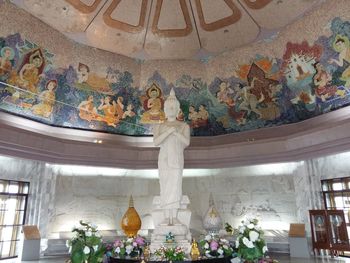 Low angle view of buddha statue in temple