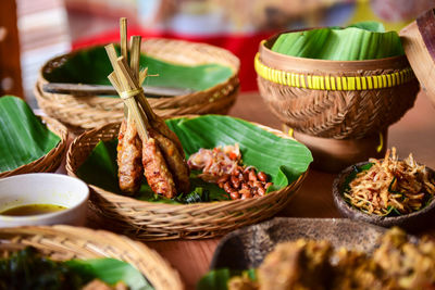 Close-up of vegetables in basket on table