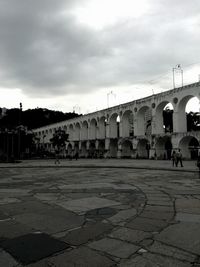 Built structure against cloudy sky