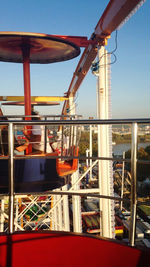 Low angle view of amusement park against sky