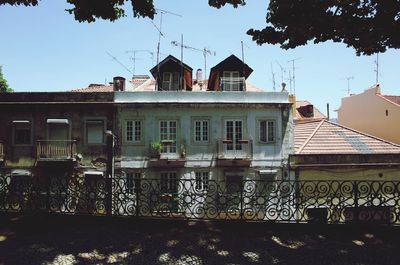 Houses against clear sky