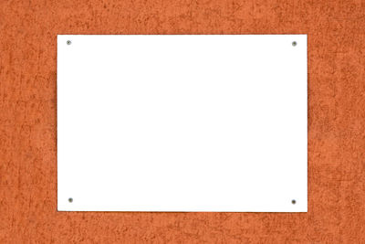 Close-up of paper against white background