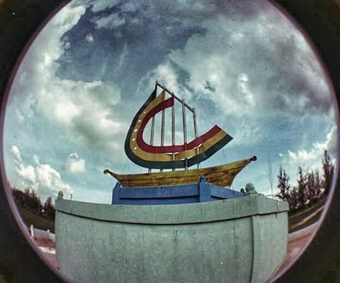 sky, cloud - sky, cloudy, built structure, architecture, cloud, building exterior, low angle view, circle, fish-eye lens, outdoors, weather, no people, day, tree, overcast, dusk, reflection, arts culture and entertainment, nature