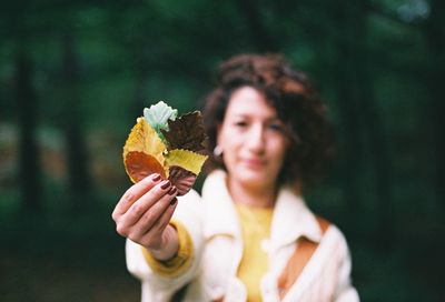 Portrait of woman holding ice cream