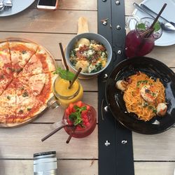 High angle view of pizza served on table