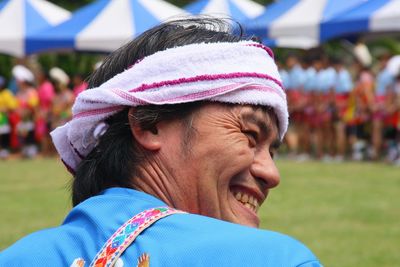 Close-up of happy man during traditional dance festival