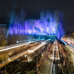 High angle view of light trails on road at night