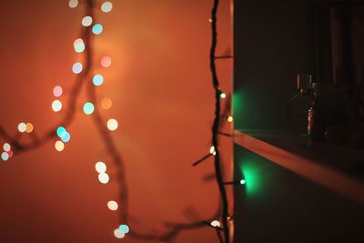 Close-up of illuminated christmas lights at night