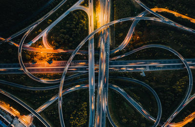 High angle view of light trails on road at night