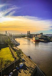 High angle view of bridge over river against sky during sunset