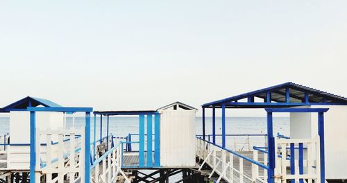 Built structure on beach against clear sky