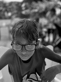 Portrait of young boy wearing glasses 
