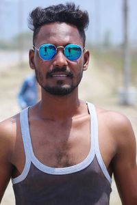 Portrait of young man wearing sunglasses