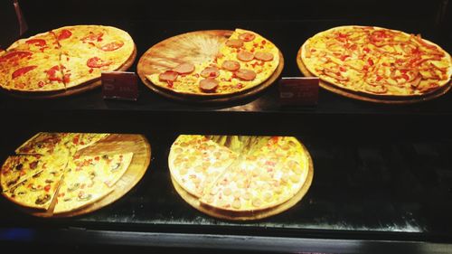 Close-up of pizza served on table