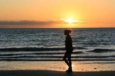 Scenic view of sea at sunset