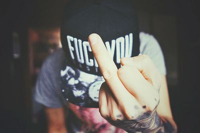 Close-up of hand holding mirror