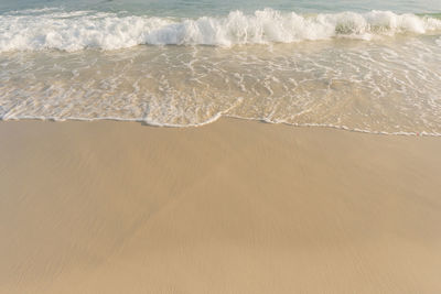 High angle view of surf on beach