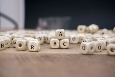 High angle view of toy blocks on wooden table