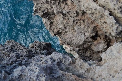 Close-up of rock in sea