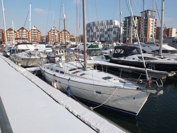 Boats moored in harbor