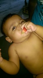 Close-up portrait of cute boy eating