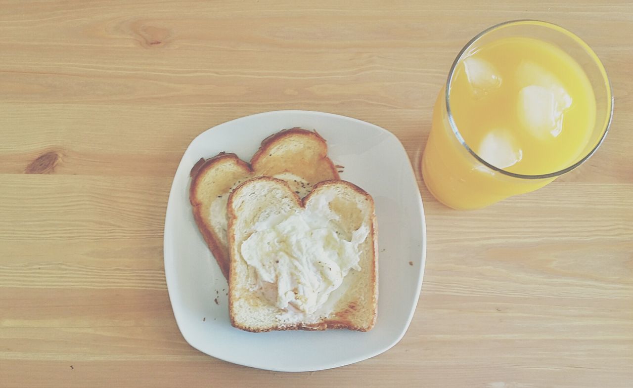 food and drink, table, freshness, drink, food, indoors, still life, refreshment, ready-to-eat, drinking glass, wood - material, high angle view, healthy eating, plate, breakfast, serving size, indulgence, bread, slice, sweet food