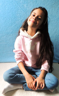 Portrait of a smiling girl sitting