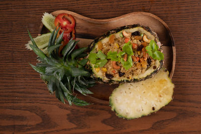 High angle view of vegetables in plate on table