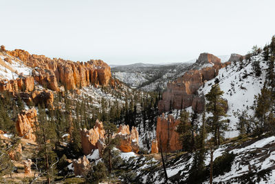 Desaturated monochrome fine art photo style of bryce canyon national park during the day in winter